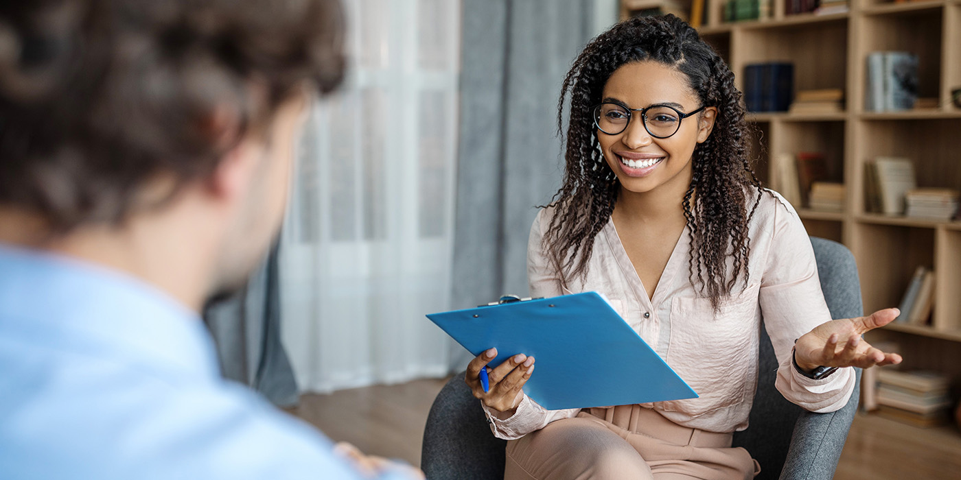 Life coach discussing a plan with a client